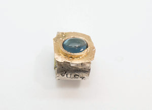 14 karat yellow gold and ailver blue topaz ring