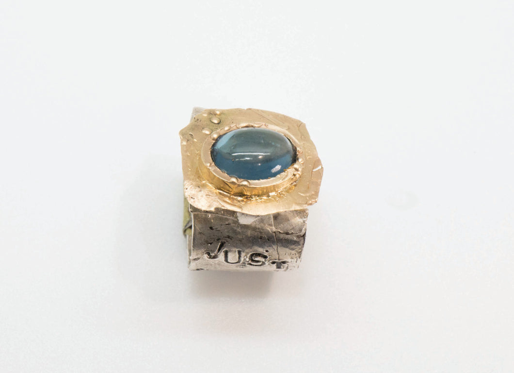 14 karat yellow gold and ailver blue topaz ring