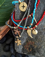 Load image into Gallery viewer, Turquoise bead bracelet with14 karat yelliw gold cross disc charm